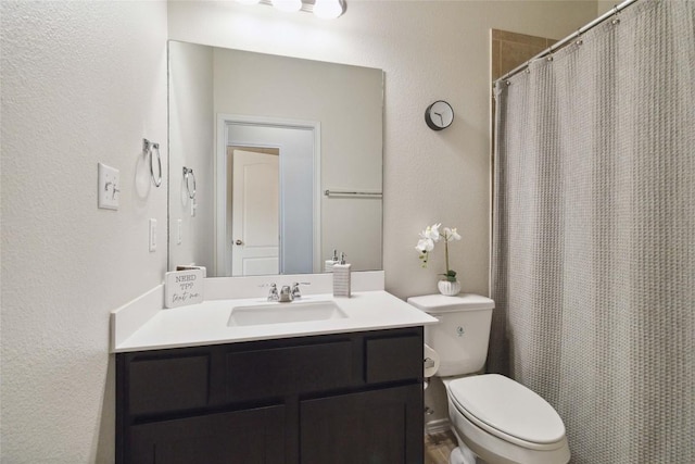 132 Sage Meadows Dr, San Marcos, TX 78666 - bathroom featuring vanity, a textured wall, and a shower with shower curtain