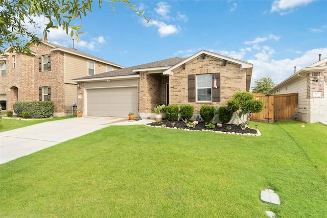132 Sage Meadows Dr, San Marcos, TX 78666 - view of front facade with brick siding, a garage, and concrete driveway