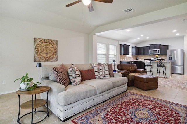 132 Sage Meadows Dr, San Marcos, TX 78666 - living room with lofted ceiling, light tile patterned flooring, a ceiling fan, and recessed lighting