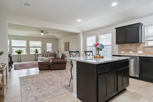 132 Sage Meadows Dr, San Marcos, TX 78666 - kitchen featuring dishwasher, plenty of natural light, ceiling fan, a center island, and recessed lighting