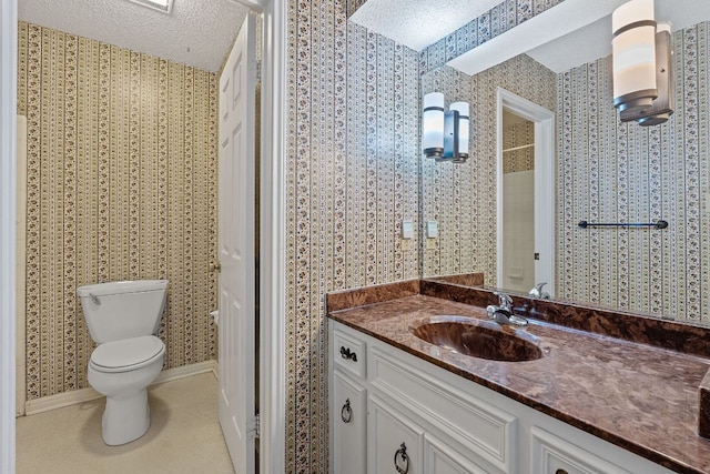13212 Broadmeade Ave, Austin, TX 78729 - bathroom featuring vanity, a textured ceiling, and tile patterned flooring