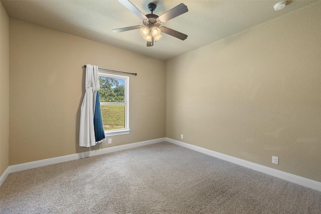 306 Anns Way, Blanco, TX 78606 - spare room featuring a smoke detector, carpet floors, and a ceiling fan