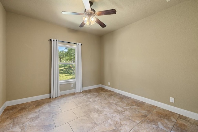 306 Anns Way, Blanco, TX 78606 - empty room featuring ceiling fan and baseboards