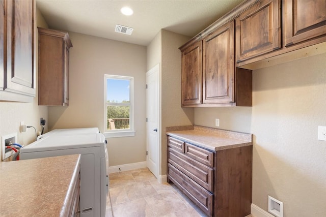 306 Anns Way, Blanco, TX 78606 - washroom featuring cabinet space, washer and clothes dryer, and recessed lighting