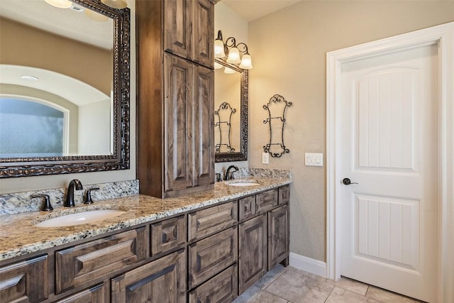 306 Anns Way, Blanco, TX 78606 - full bath featuring double vanity and tile patterned flooring