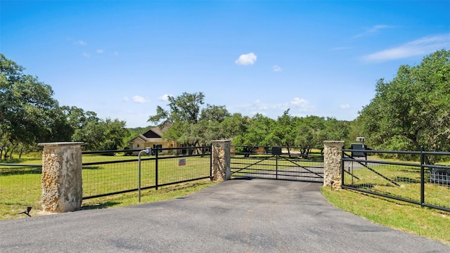 306 Anns Way, Blanco, TX 78606 - gate with a view of rural / pastoral area
