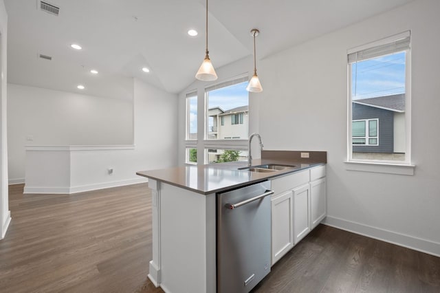 2050 Lohmans Spur Rd Unit 802, Lakeway, TX 78734 - kitchen with stainless steel dishwasher, white cabinets, dark wood-style flooring, recessed lighting, and pendant lighting