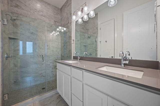2050 Lohmans Spur Rd Unit 802, Lakeway, TX 78734 - bathroom featuring double vanity, a shower stall, and marble look tiles