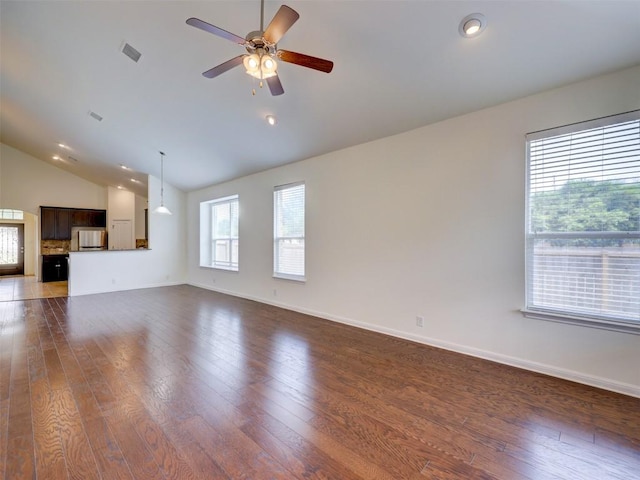 11600 Yeadon Way, Austin, TX 78717 - unfurnished living room featuring lofted ceiling, hardwood / wood-style floors, a ceiling fan, and recessed lighting