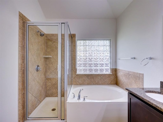 11600 Yeadon Way, Austin, TX 78717 - bathroom with a garden tub, vanity, and a stall shower