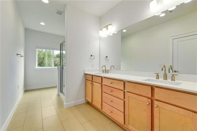 6800 Menchaca Rd Unit 45, Austin, TX 78745 - full bathroom with double vanity, a stall shower, tile patterned floors, and recessed lighting