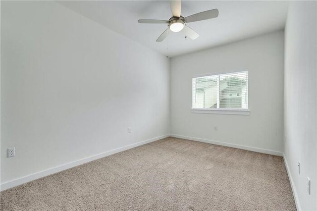 6800 Menchaca Rd Unit 45, Austin, TX 78745 - spare room featuring light colored carpet and a ceiling fan