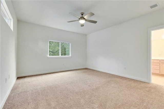 6800 Menchaca Rd Unit 45, Austin, TX 78745 - spare room with carpet flooring, a ceiling fan, and healthy amount of natural light