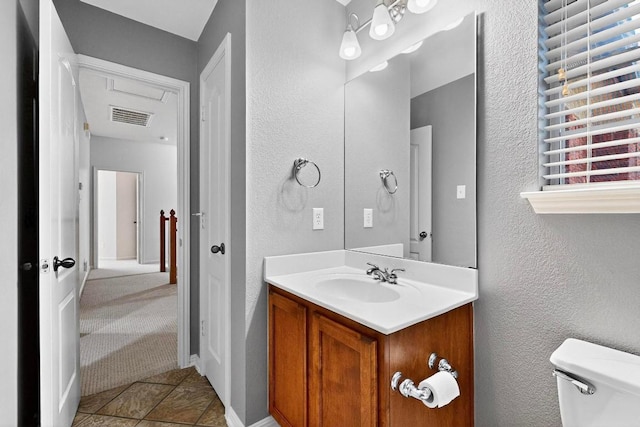 1532 Homewood Cir, Round Rock, TX 78665 - bathroom with vanity, a textured wall, and tile patterned floors