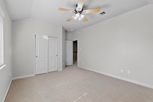 1532 Homewood Cir, Round Rock, TX 78665 - unfurnished bedroom featuring vaulted ceiling, light colored carpet, a closet, and ceiling fan