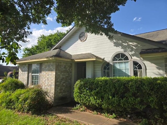 1608 Peridot Rd, Pflugerville, TX 78660 - view of side of property featuring brick siding