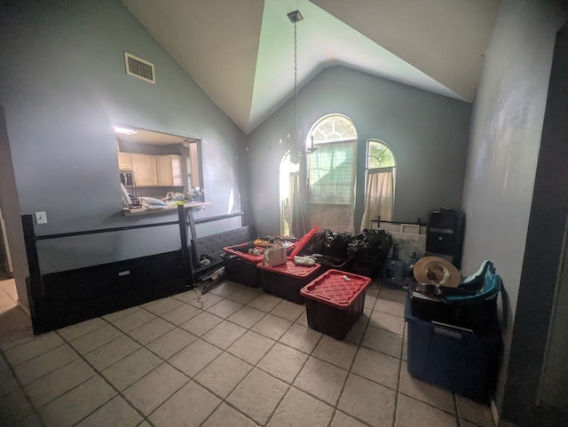 1608 Peridot Rd, Pflugerville, TX 78660 - living area with lofted ceiling and light tile patterned floors