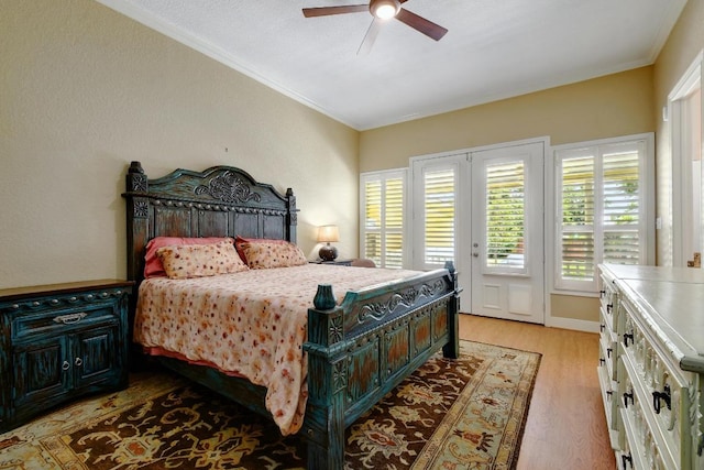 260 N Santa Clara Ave, New Braunfels, TX 78130 - bedroom featuring access to outside, light wood finished floors, crown molding, and ceiling fan