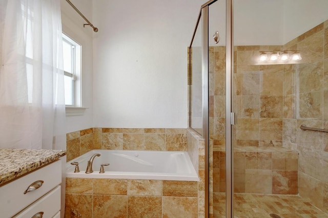 260 N Santa Clara Ave, New Braunfels, TX 78130 - bathroom with a garden tub, a stall shower, and vanity