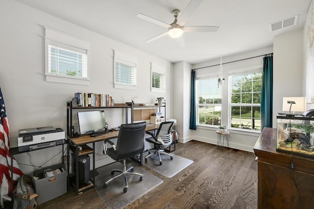 211 Nodena Dr, Dripping Springs, TX 78620 - home office featuring dark wood-type flooring, healthy amount of natural light, and ceiling fan