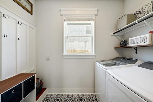 211 Nodena Dr, Dripping Springs, TX 78620 - washroom featuring washing machine and dryer and tile patterned floors