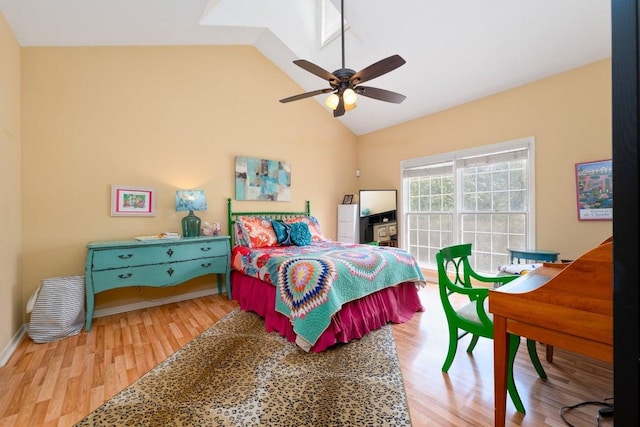 3200 Duval St Unit 309, Austin, TX 78705 - bedroom with wood finished floors, lofted ceiling, and a ceiling fan