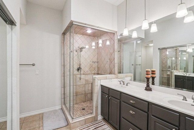 300 San Gabriel Village Blvd Unit 423, Georgetown, TX 78626 - full bath with a stall shower, double vanity, and tile patterned flooring