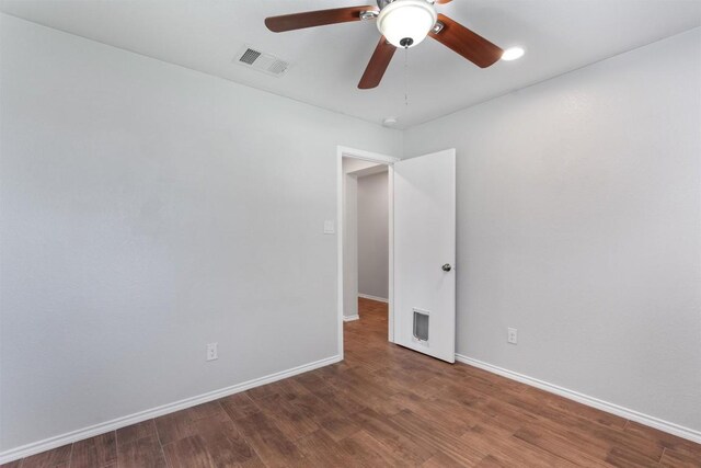 620 Lavaca Loop, Elgin, TX 78621 - empty room with wood finished floors and ceiling fan