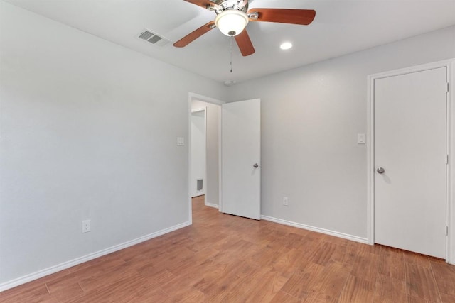 620 Lavaca Loop, Elgin, TX 78621 - unfurnished bedroom with light wood-type flooring, ceiling fan, and recessed lighting