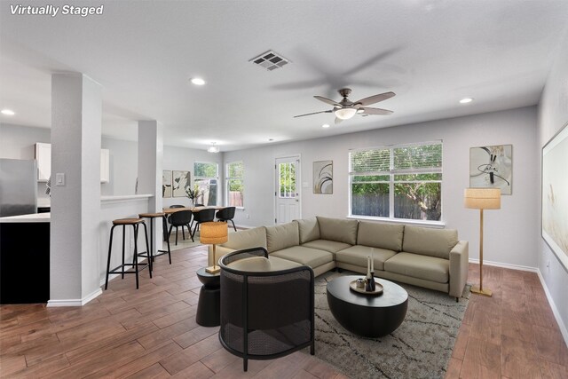 620 Lavaca Loop, Elgin, TX 78621 - living room with recessed lighting, ceiling fan, and wood finished floors