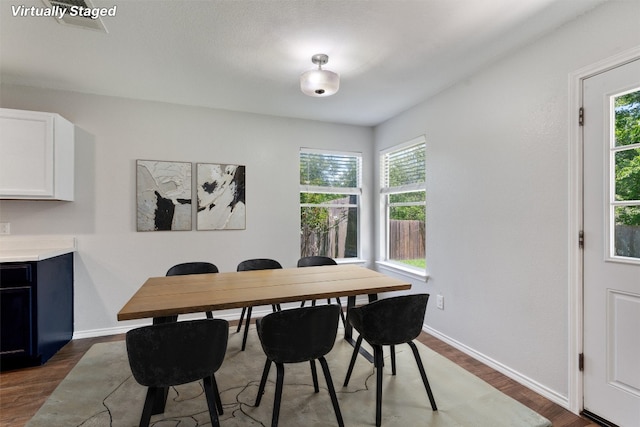 620 Lavaca Loop, Elgin, TX 78621 - dining room with wood finished floors and baseboards