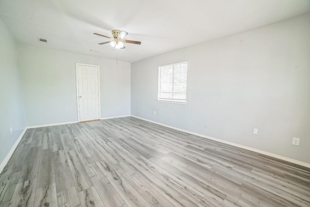 1001 Acanthus St, Pflugerville, TX 78660 - spare room featuring light wood-style floors and a ceiling fan