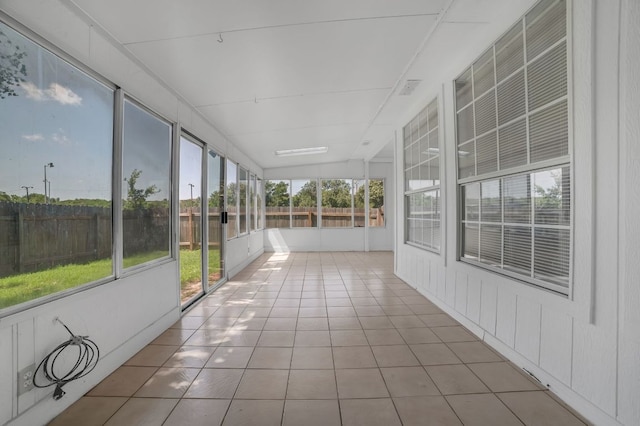 1001 Acanthus St, Pflugerville, TX 78660 - unfurnished sunroom with tile patterned flooring