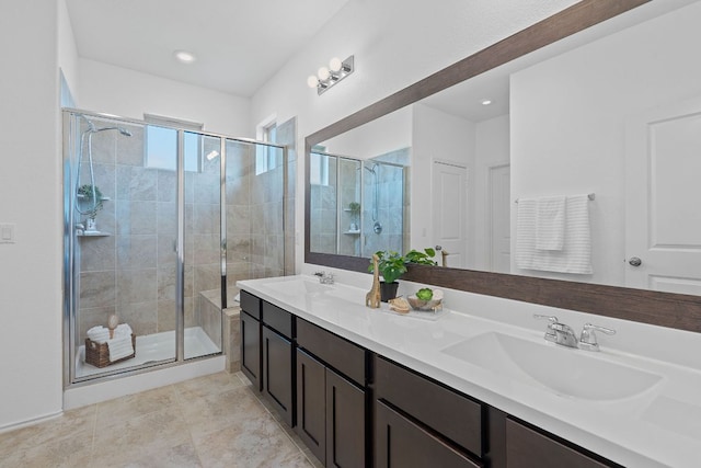 1207 Diggy Dr, Austin, TX 78748 - bathroom with a stall shower, double vanity, and tile patterned flooring
