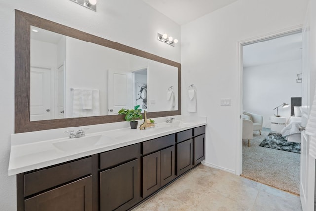 1207 Diggy Dr, Austin, TX 78748 - ensuite bathroom with double vanity and tile patterned flooring