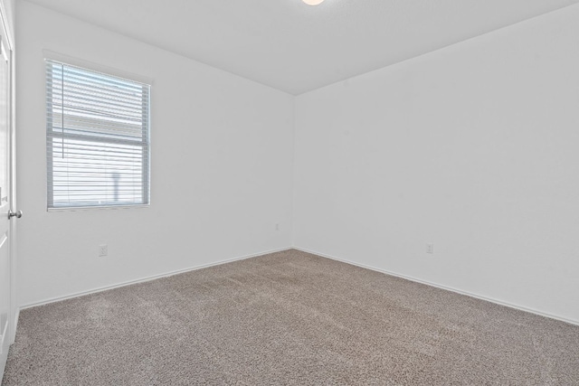 1207 Diggy Dr, Austin, TX 78748 - carpeted spare room featuring baseboards
