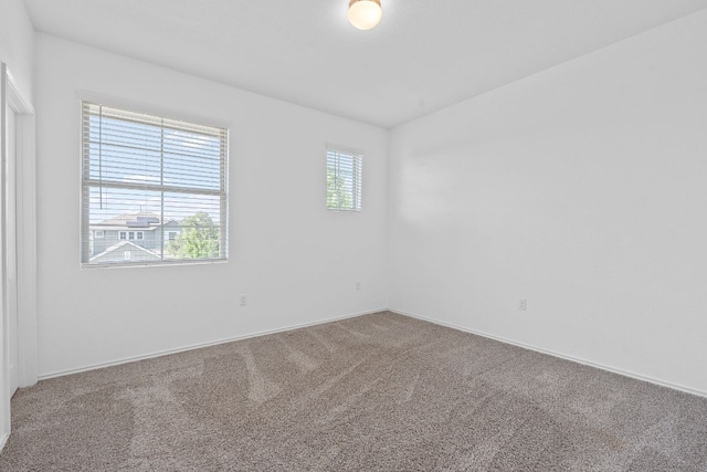 1207 Diggy Dr, Austin, TX 78748 - carpeted spare room featuring baseboards