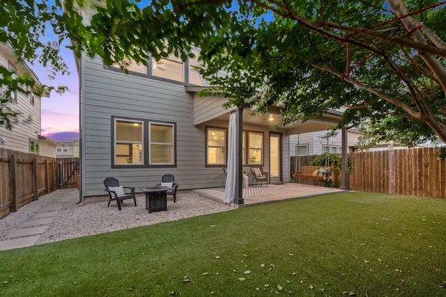 1207 Diggy Dr, Austin, TX 78748 - back of house featuring a patio area, a fenced backyard, and a fire pit