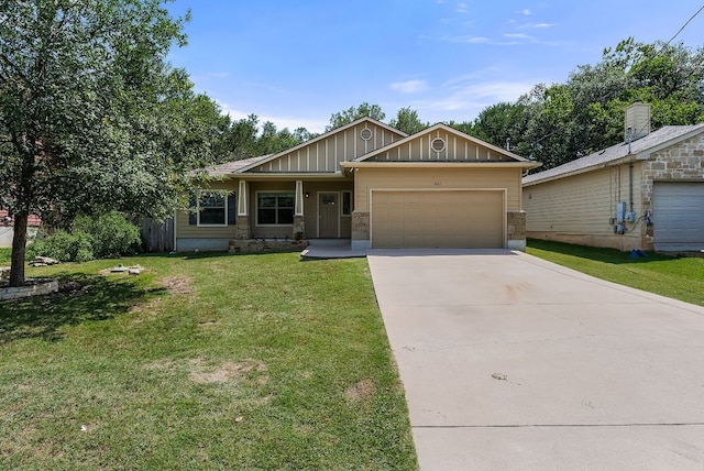 14601 Running Deer Trl, Austin, TX 78734 - craftsman-style home with a garage, concrete driveway, board and batten siding, and a front lawn