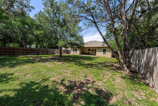 14601 Running Deer Trl, Austin, TX 78734 - fenced backyard featuring a patio
