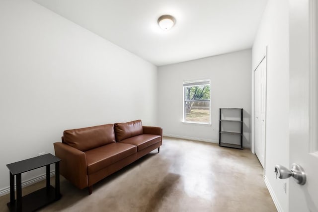 14601 Running Deer Trl, Austin, TX 78734 - sitting room featuring baseboards and concrete floors