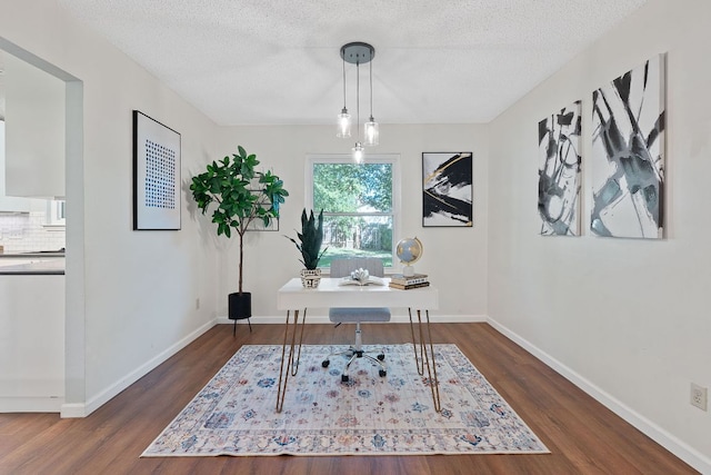 8206 Avocet Dr, Austin, TX 78745 - office space featuring dark wood-style flooring and a textured ceiling