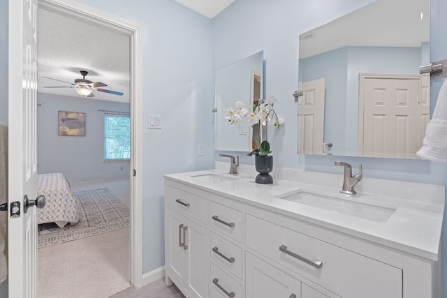 8206 Avocet Dr, Austin, TX 78745 - ensuite bathroom featuring double vanity and a ceiling fan