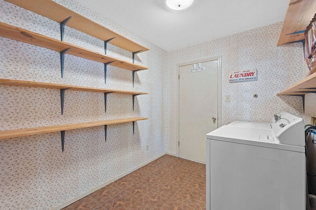 8206 Avocet Dr, Austin, TX 78745 - laundry area with independent washer and dryer and wallpapered walls
