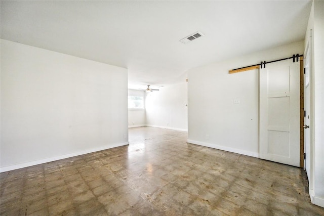 6907 Deborah Dr, Austin, TX 78752 - unfurnished room featuring a barn door