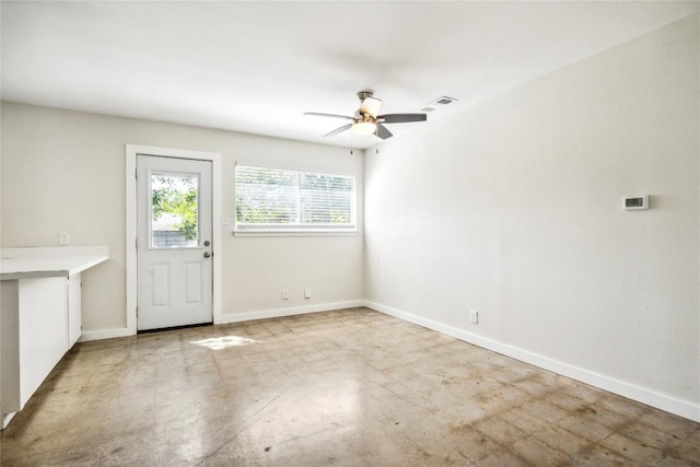 6907 Deborah Dr, Austin, TX 78752 - unfurnished dining area featuring a ceiling fan and baseboards