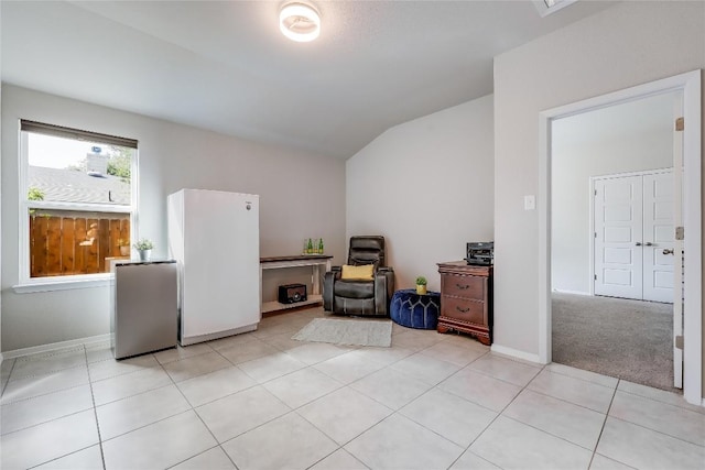 1901 Owens Ln, Lago Vista, TX 78645 - empty room with lofted ceiling and light tile patterned floors