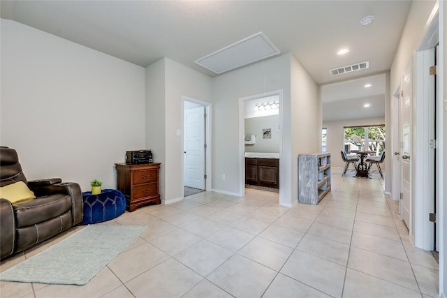 1901 Owens Ln, Lago Vista, TX 78645 - living area featuring attic access, light tile patterned floors, and recessed lighting
