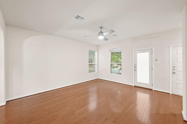 1900 Tramson Dr Unit 94C, Austin, TX 78741 - spare room featuring wood finished floors and ceiling fan
