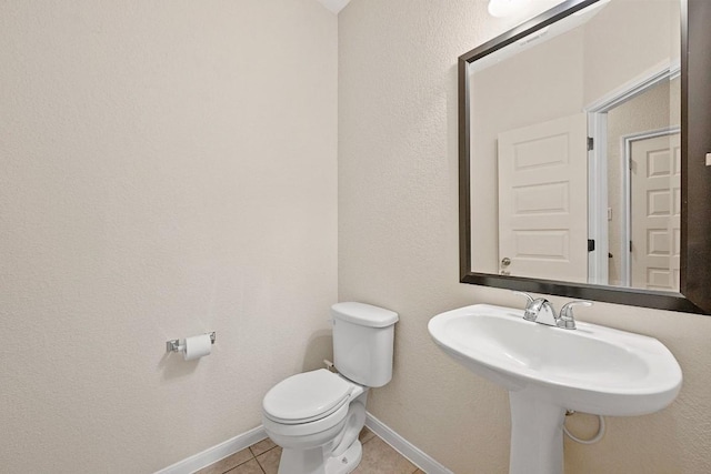 1900 Tramson Dr Unit 94C, Austin, TX 78741 - bathroom featuring toilet and tile patterned floors